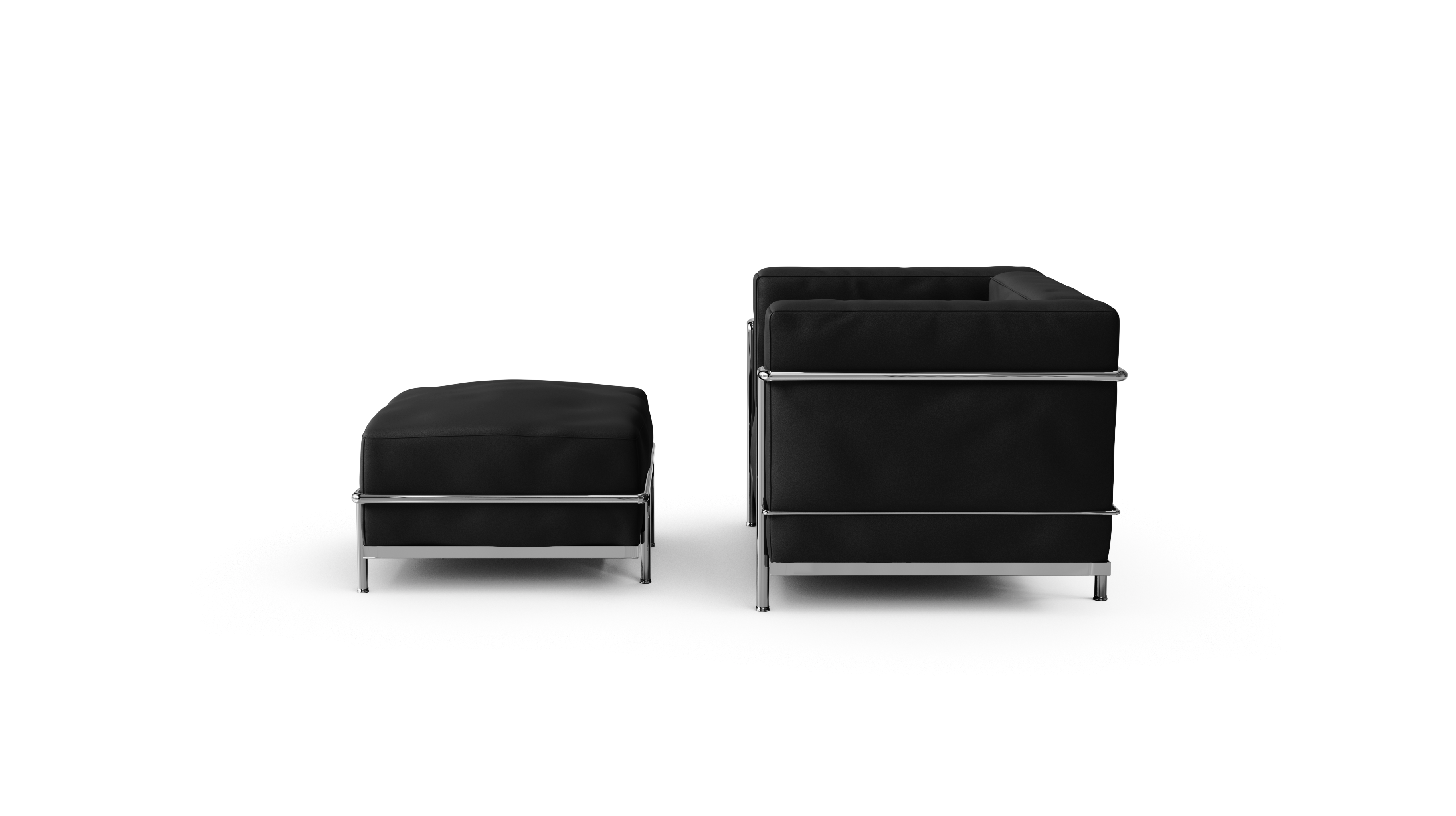 Side View of Le Corbusier LC3 Armchair & Ottoman in a white studio, down feather cushion version.