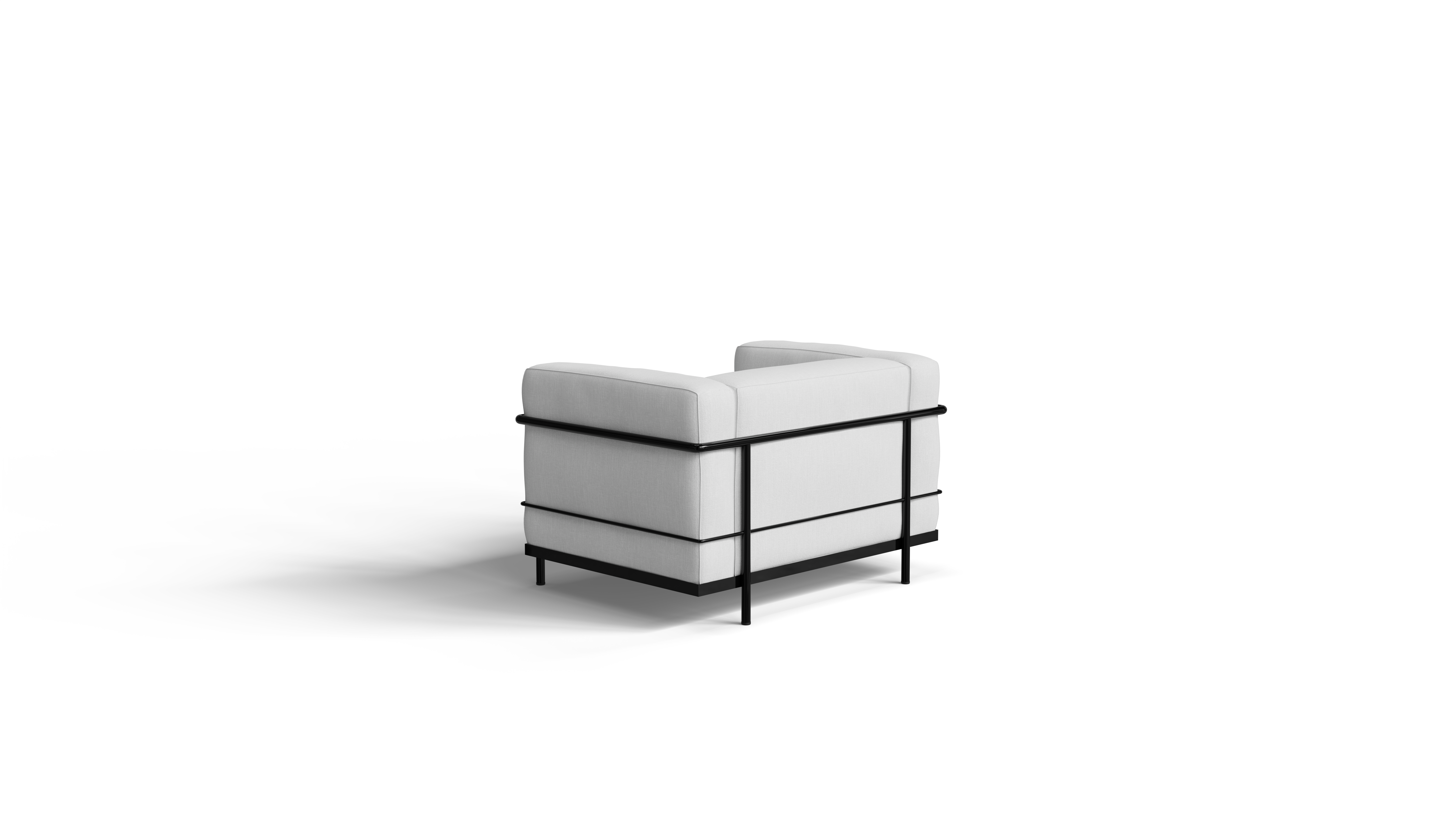 White Le Corbusier LC3 armchair with black frame on a white background, back-angle view
