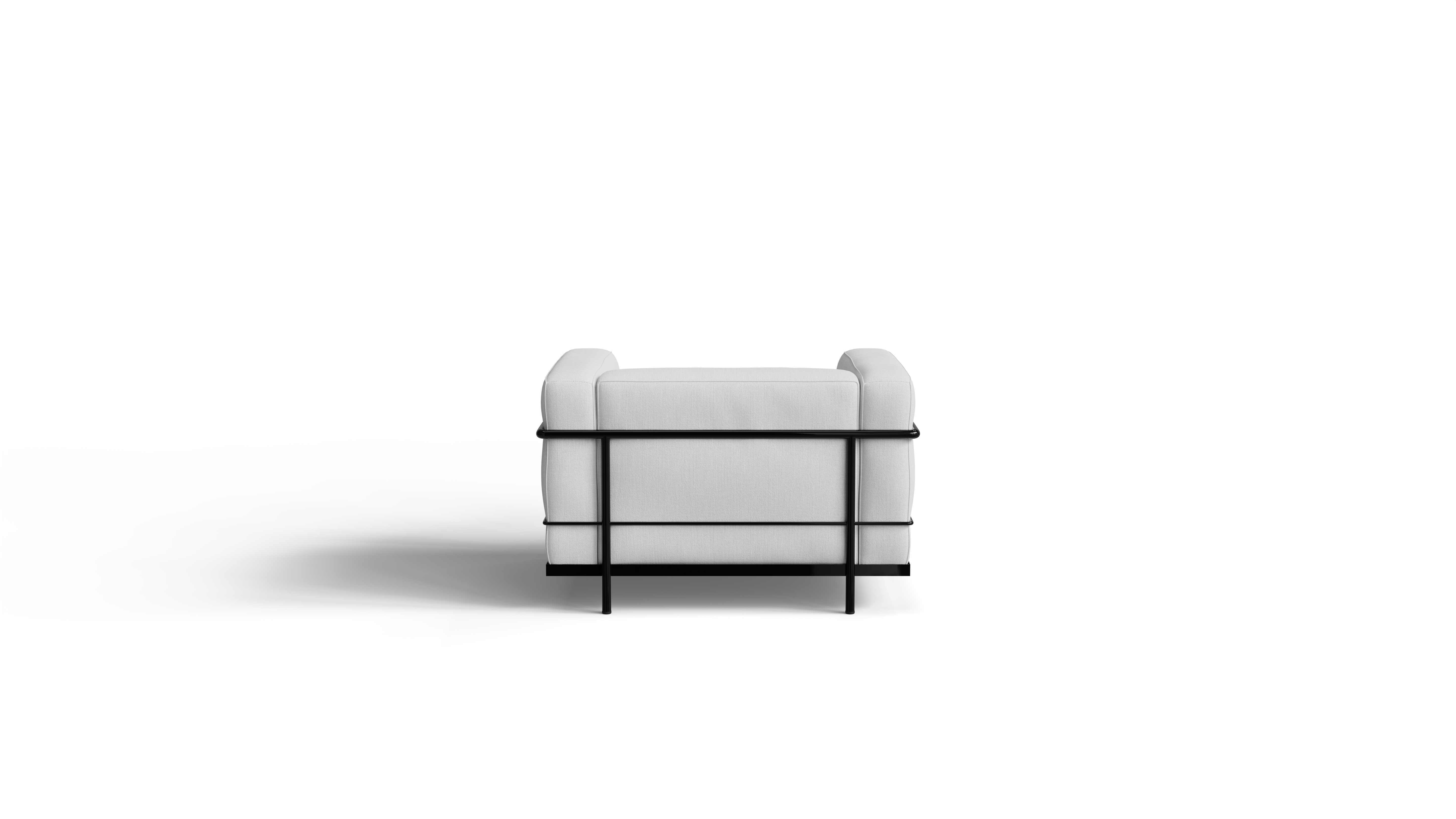 White Le Corbusier LC3 armchair with black frame on a white background, back view