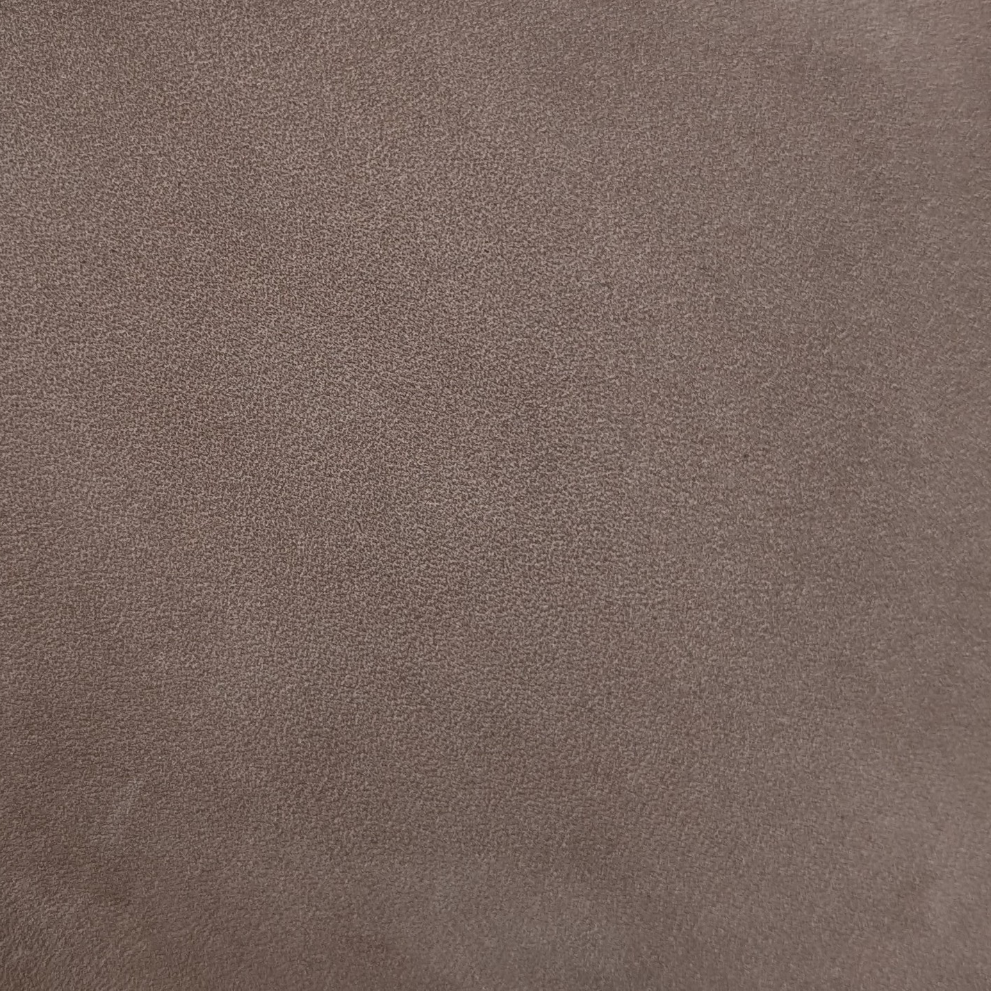 A full-aniline Brazilian nubuck with heavily buffed surface creating a velvet texture. Buffing reduces visible grain, while the nap reveals a subtle color variation when touched. This hide offers excellent depth with a soft hand and substantial body.
ORIGIN: Americas | Brazil
DYE: Full-Aniline
GRAIN TYPE: Made from Full-Grain, Natural Pattern
HAND: Soft & Velvety
THICKNESS: 1.4 mm
FINISH: Heavily Buffed Surface
SURFACE: Even Color with Directional Variation
DIGITAL SWATCH: 2.5x2.5"