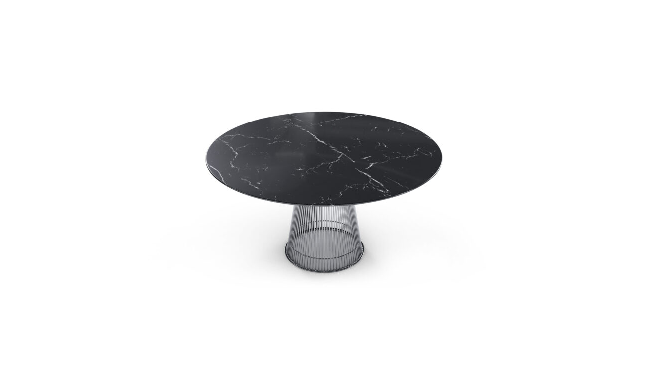 Front angle view of the Platner Dining Table 54" Round Nero Marquina Stone Black Marble on Mirror Chrome Base by Warren Platner, available online in Canada.