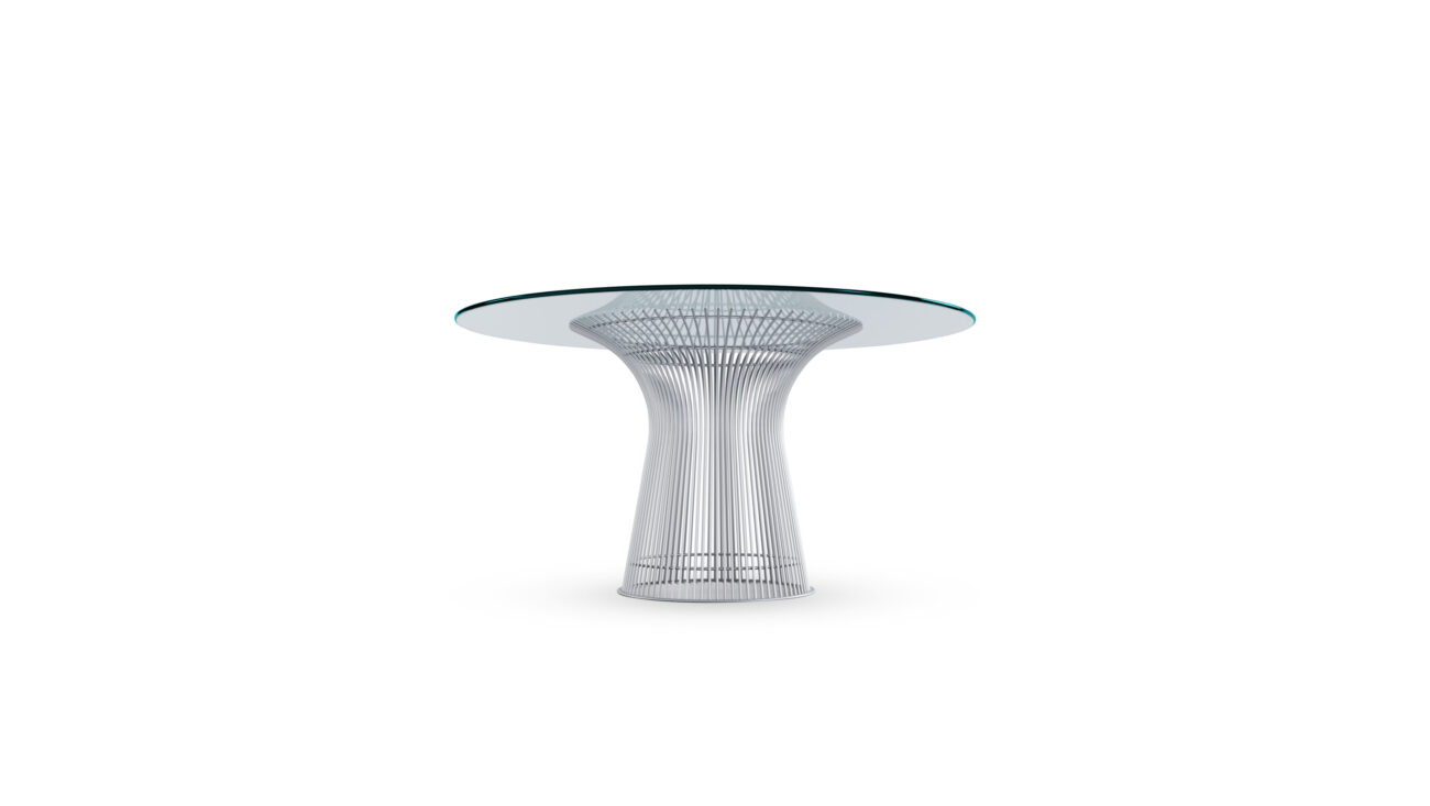 Side view of the Platner Series 3716 Dining Table 54 Round Clear Glass on Matte Chrome Base by Warren Platner, designed by Warren Platner, available online in Canada. Made by Archetype Forms.