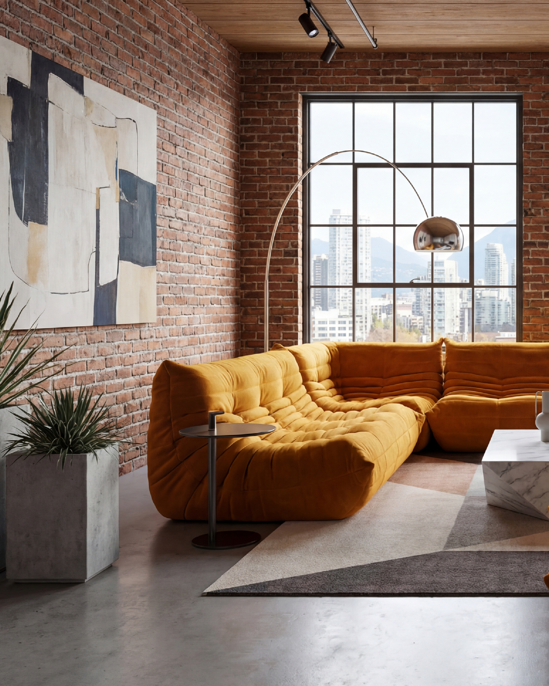 Modern living room with yellow velvet Michel Ducaroy TOGO Sofa 3-Seater without Arms model r-3232 repro sectional sofa, coffee table, and cityscape view. Mobile Hero