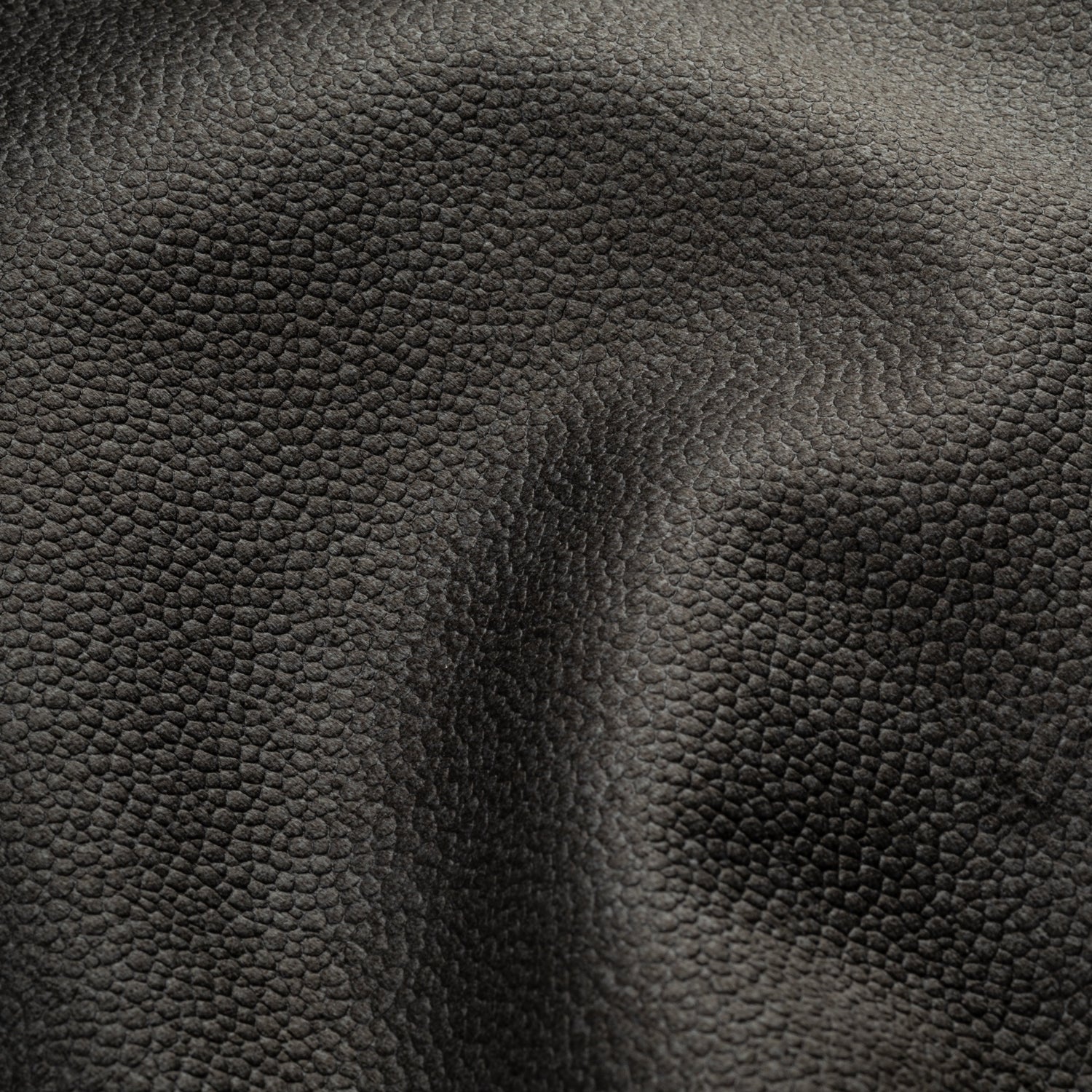 This embossed vegan sueded leather has the rough charisma of a true Argentinian gaucho, and the soft touch of its beloved horses. The longer pile of suede on top gives it a luxurious look and feel. It brings artisanal texture and authentic character to any piece.

COMPOSITION: 100% PES
WEIGHT: 518 g/m²
MARTINDALE ABR. EP: 25k+ Rubs
