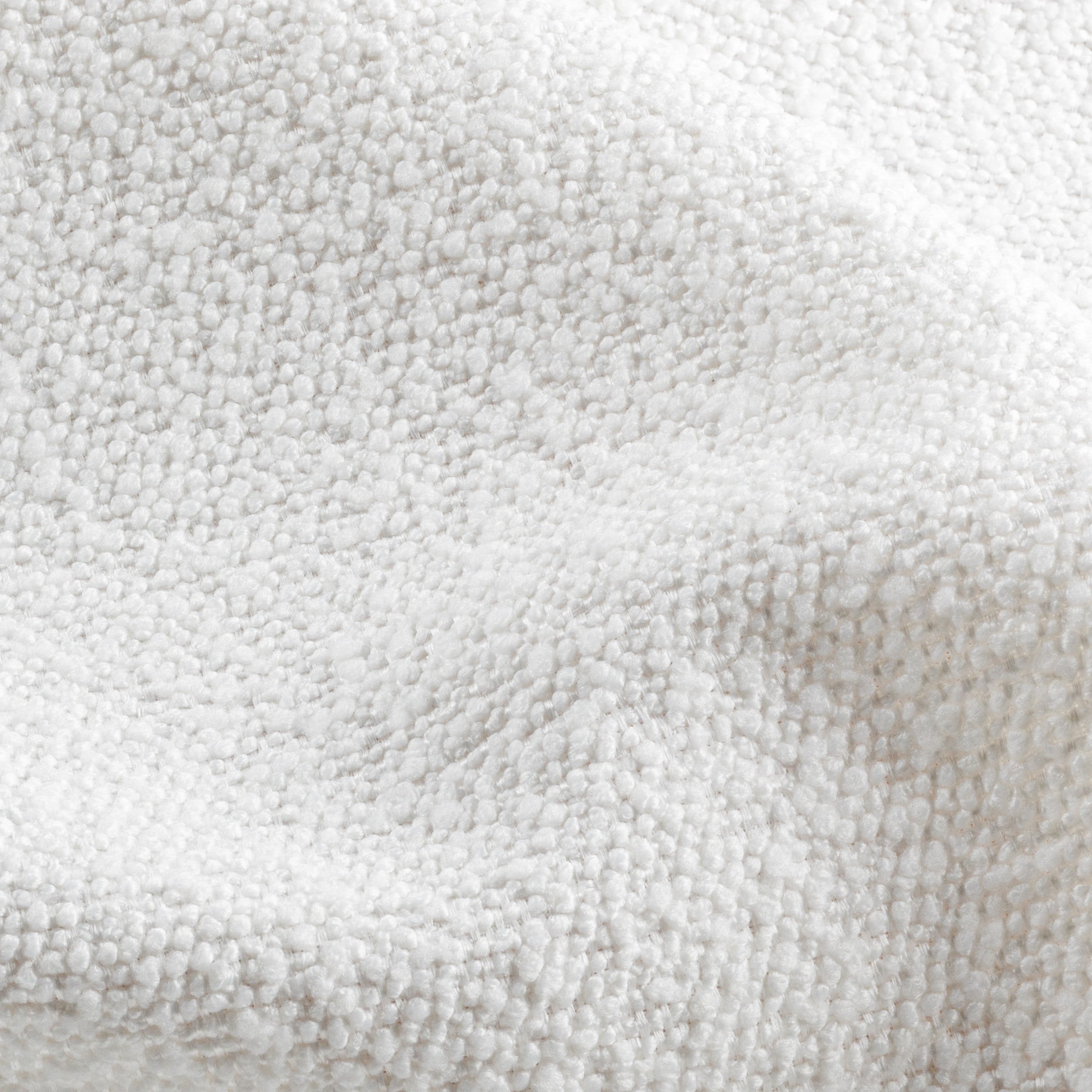 Inspired by artisanal knitwork, this classic boucle’s defined loops and knot details offer a cozy, refined finish. The fabric's substantial weight imparts a rich body, bringing subtle dimension and an enduring elegance to interiors.

COMPOSITION: 100% PES
WEIGHT: 605 g/m²
WYZENBEEK EP: 100k+ Rubs
MARTINDALE ABR. EP: 100k+ Rubs