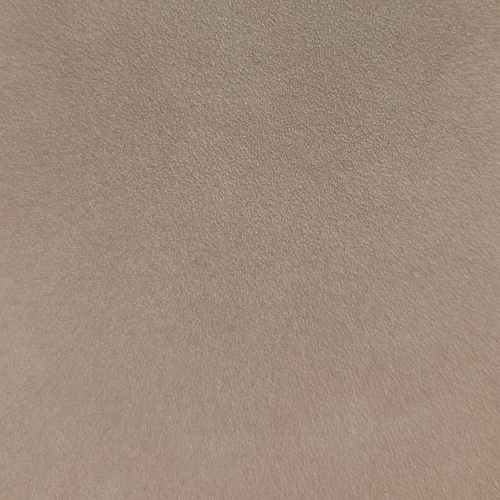 A full-aniline Brazilian nubuck with heavily buffed surface creating a velvet texture. Buffing reduces visible grain, while the nap reveals a subtle color variation when touched. This hide offers excellent depth with a soft hand and substantial body.

ORIGIN: Americas | Brazil
DYE: Full-Aniline
GRAIN TYPE: Made from Full-Grain, Natural Pattern
HAND: Soft & Velvety
THICKNESS: 1.4 mm
FINISH: Heavily Buffed Surface
SURFACE: Even Color with Directional Variation
DIGITAL SWATCH: 2.5x2.5"