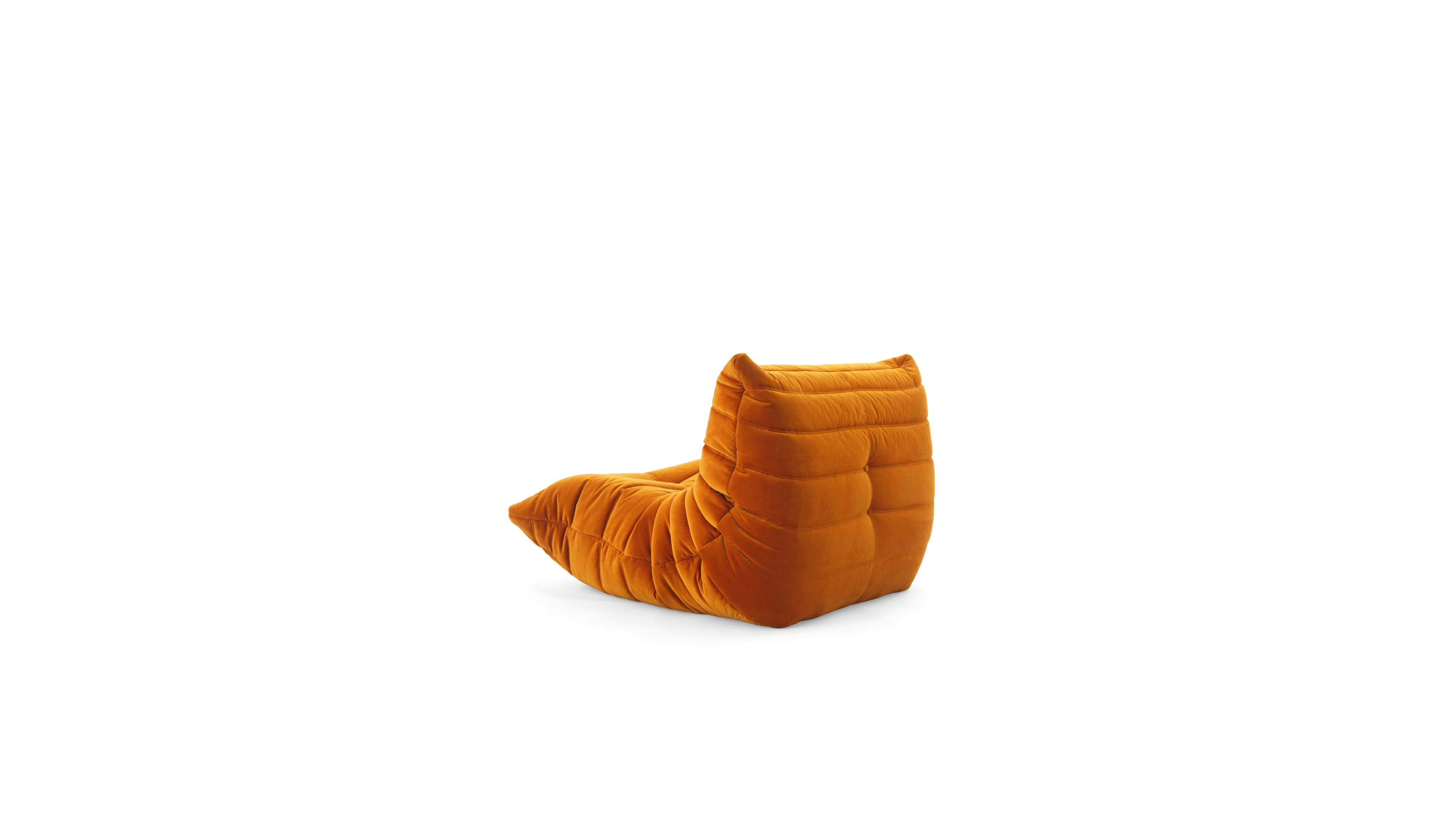 An orange modular TOGO Fireside lounge chair with a low, rounded back and a pointed footrest, upholstered in a textured bouclé fabric, shown on a plain white background.