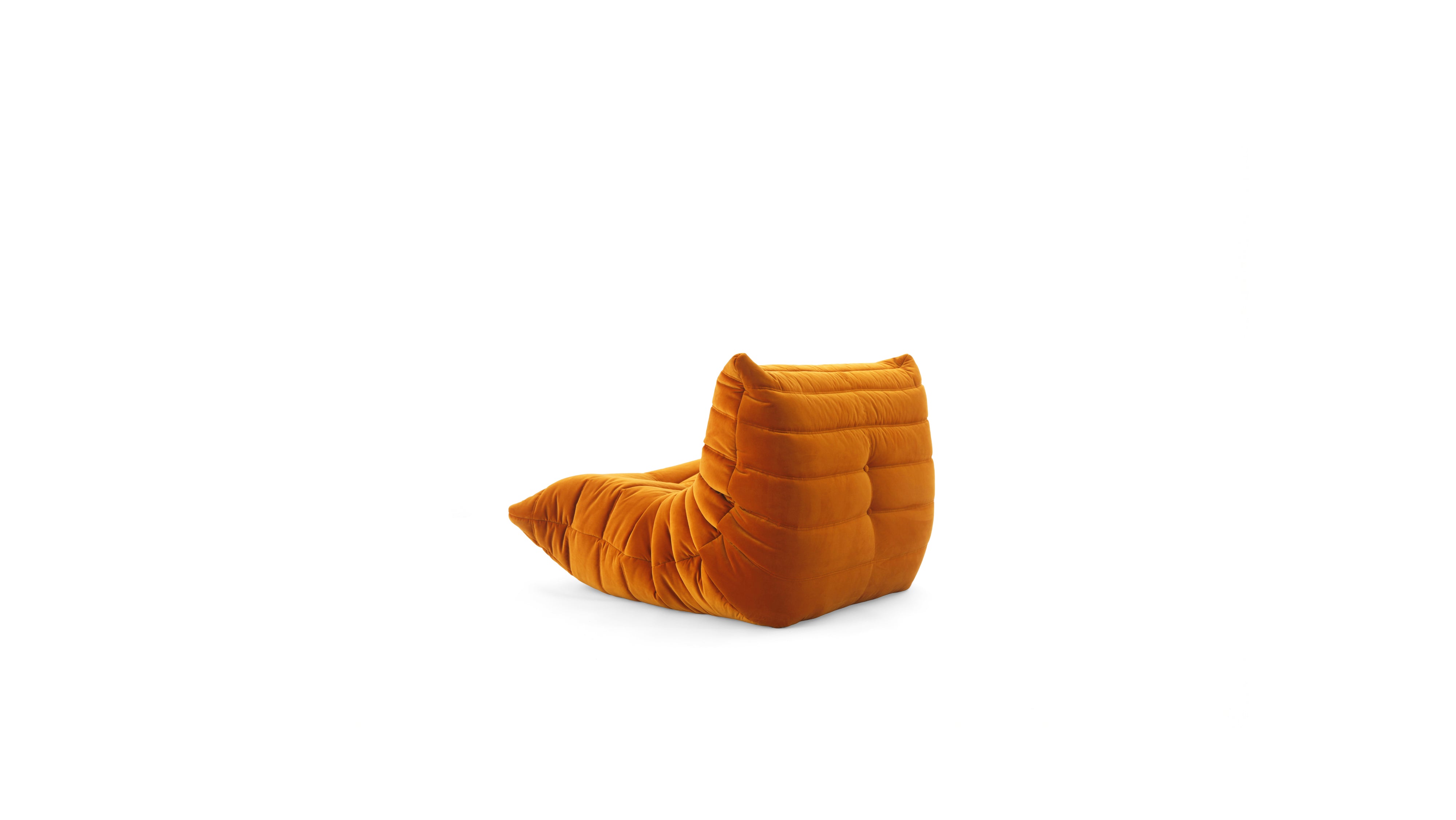 An orange modular TOGO Fireside lounge chair with a low, rounded back and a pointed footrest, upholstered in a textured bouclé fabric, shown on a plain white background.