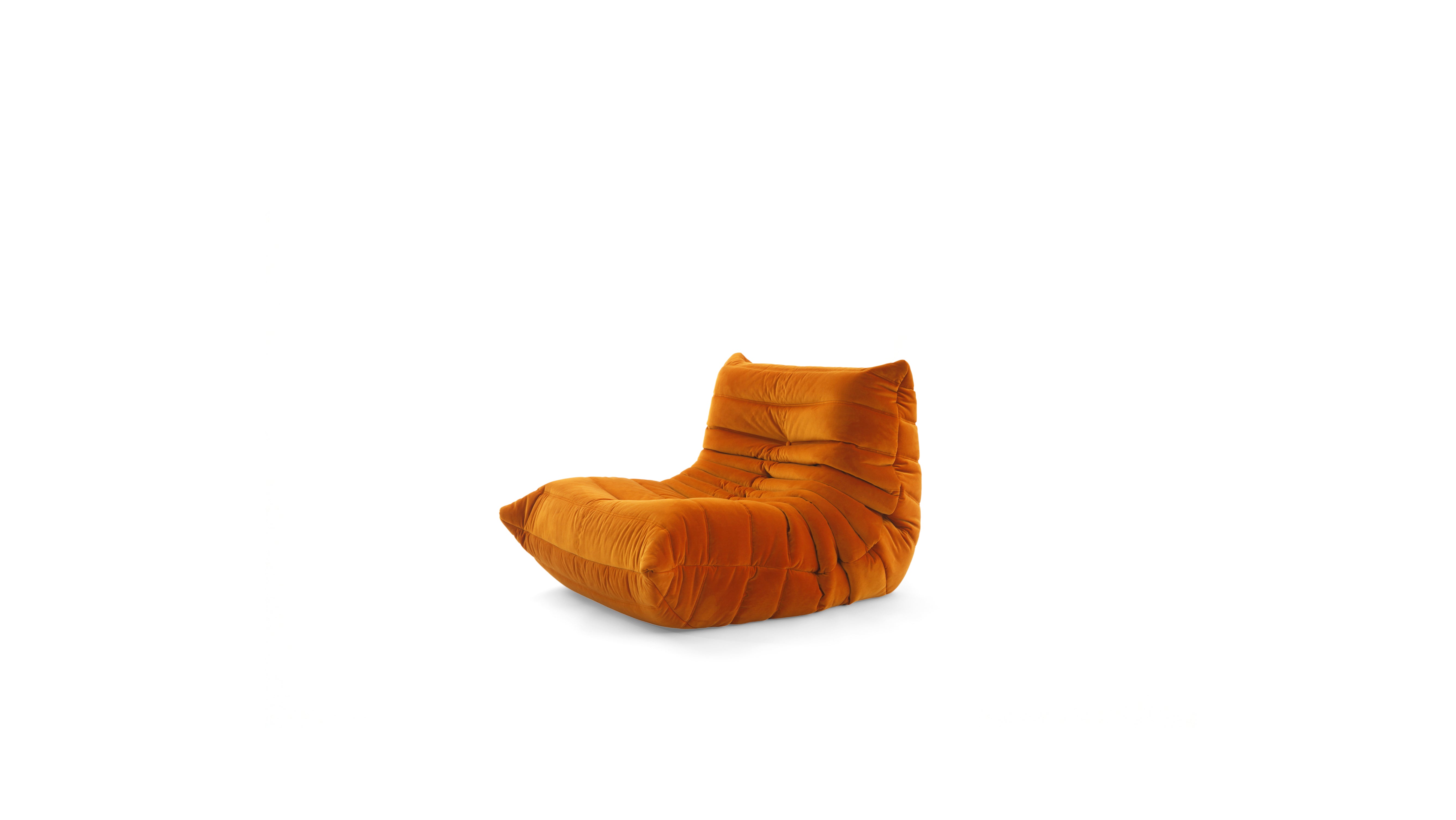 An orange modular TOGO Fireside chair with a high backrest, shown on a solid white background.