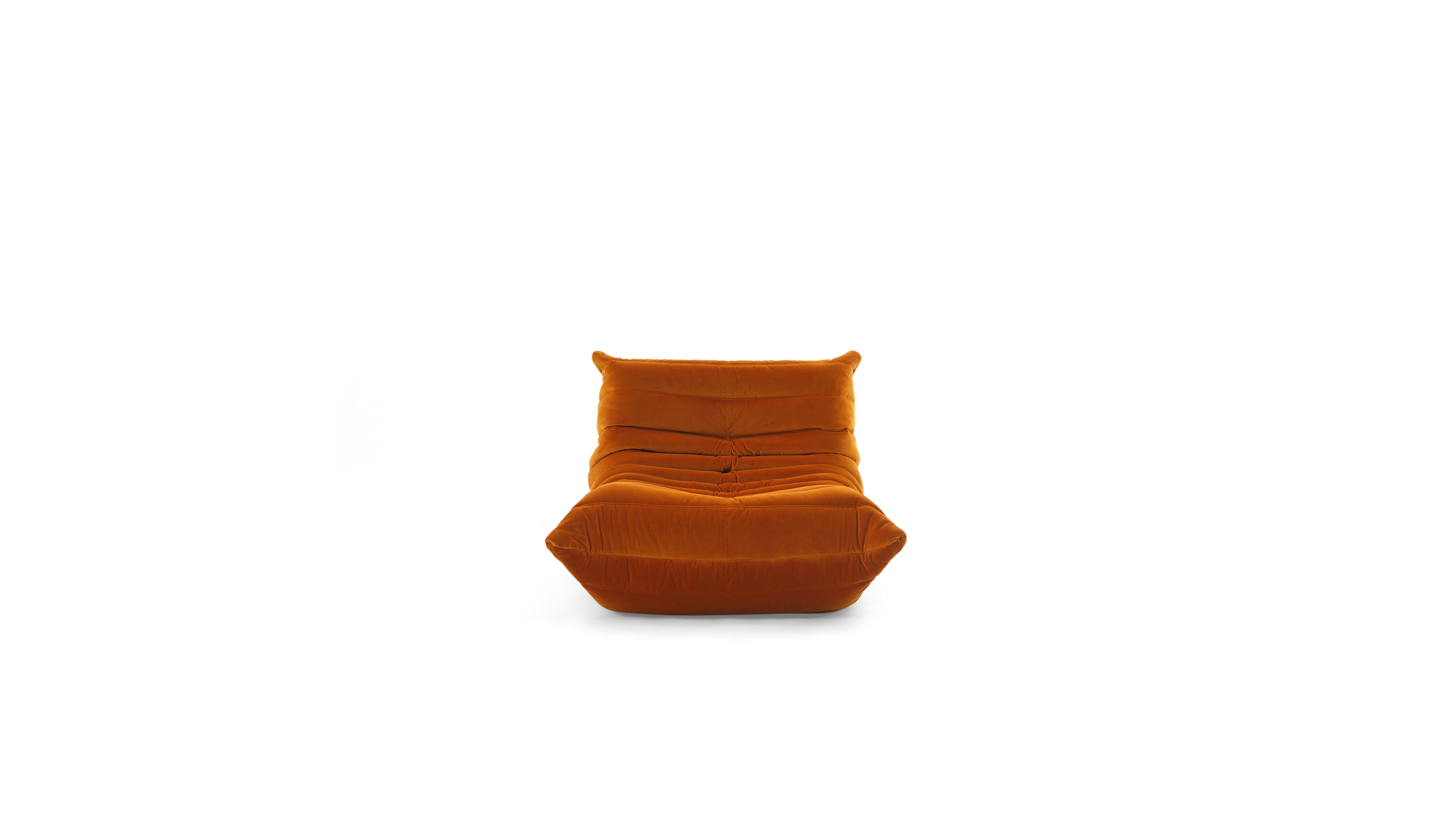 An orange TOGO Fireside lounge chair with a segmented, geometric design, shown against a plain white background.