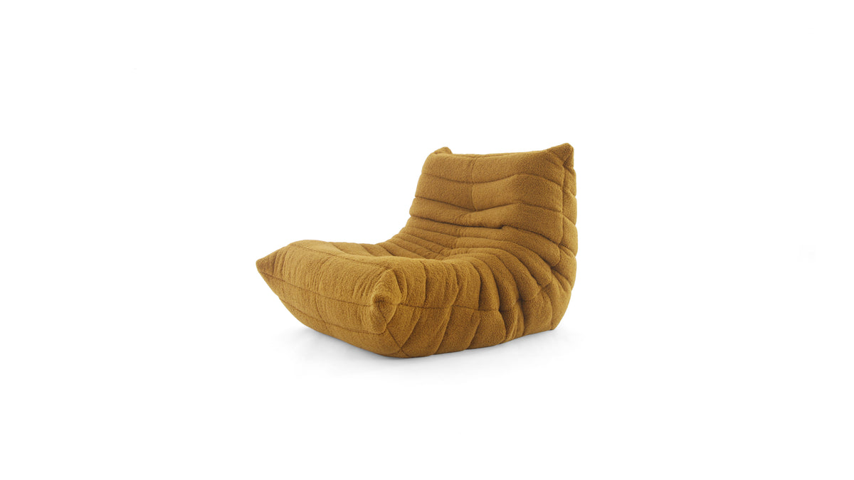 A mustard TOGO Fireside Chair in a textured fabric, shown from a front angle on a plain white background.
