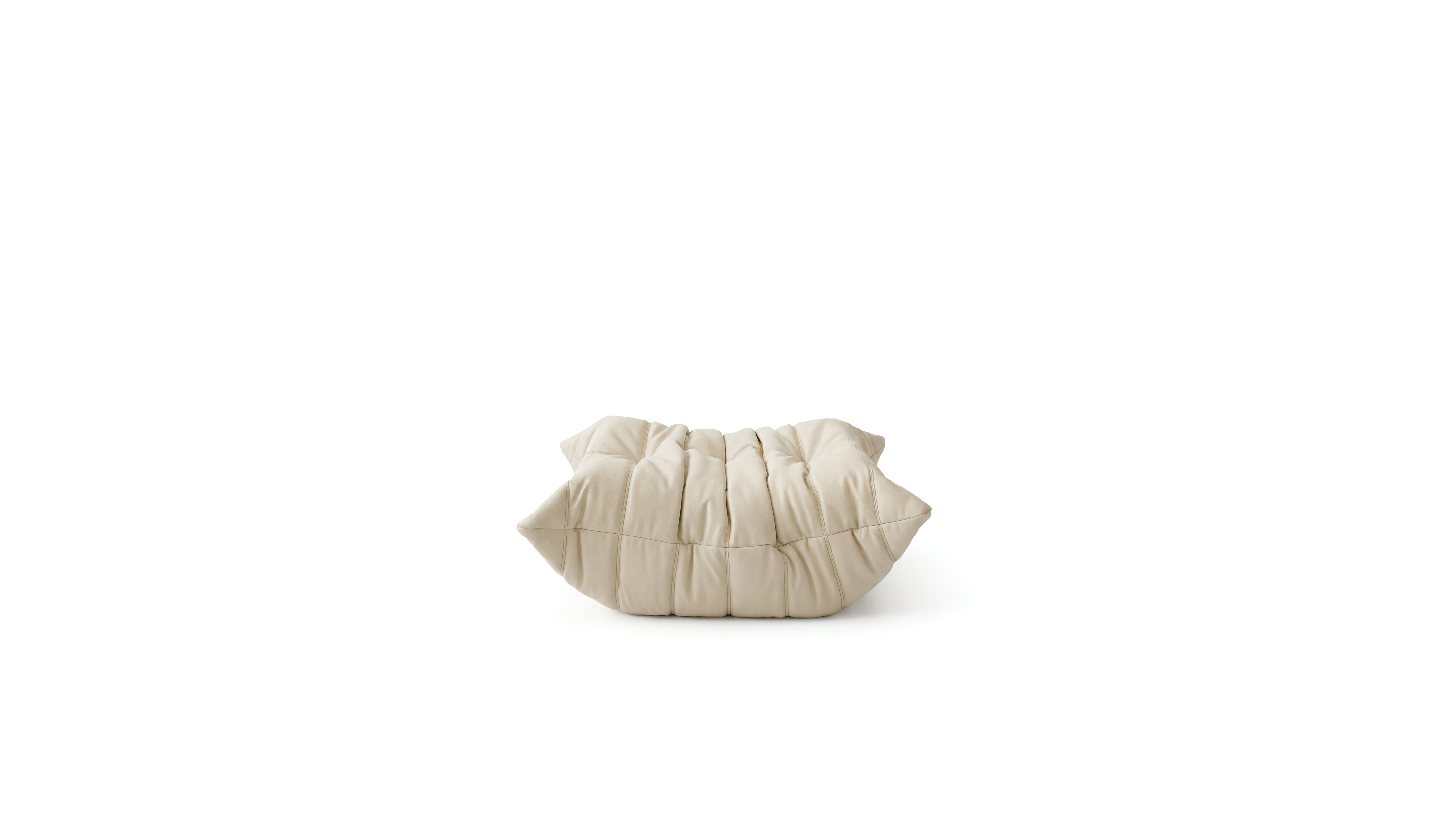 Cream Leather Michel Ducaroy TOGO Footstool on a white background - Side, R-3236 in the USA in Canada repr.